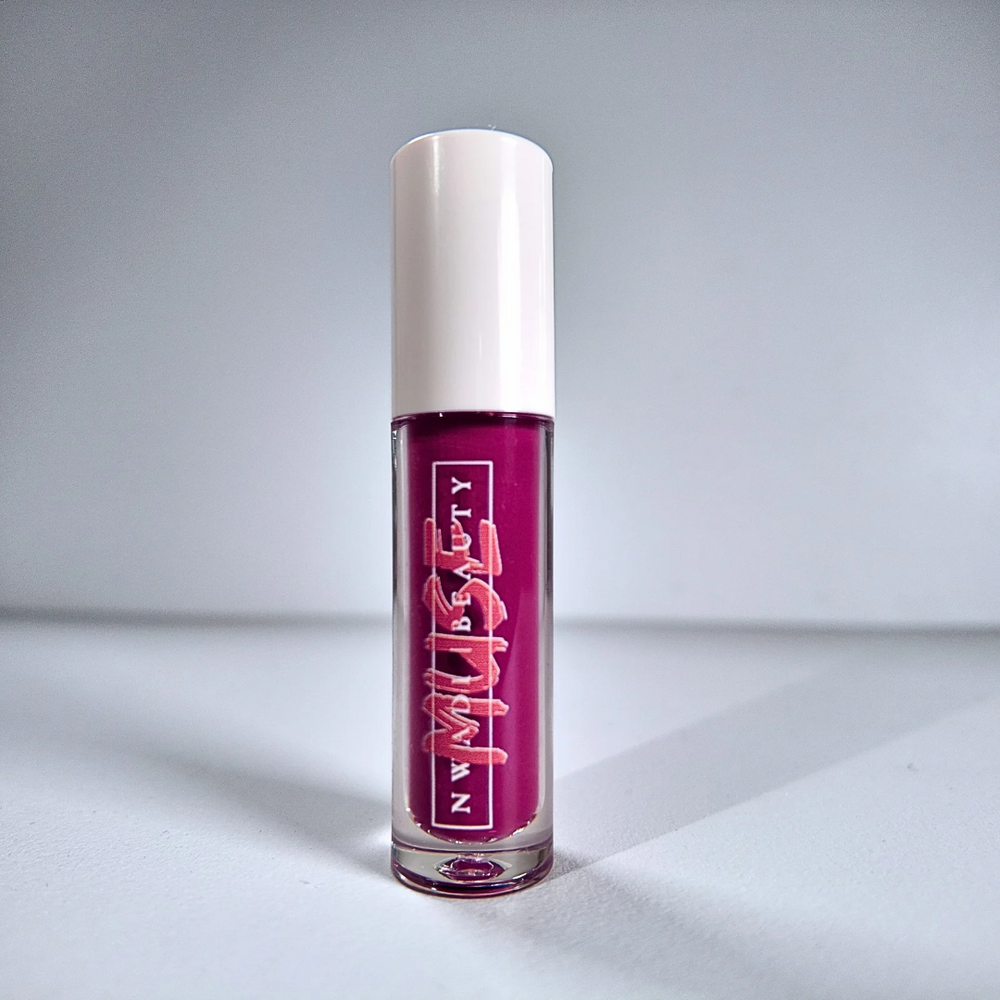 Matte Muse nude lip gloss on melanin-rich lips with velvet finish