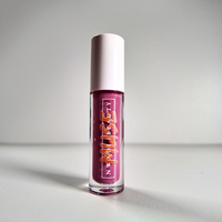 Matte Muse nude lip gloss on melanin-rich lips with velvet finish